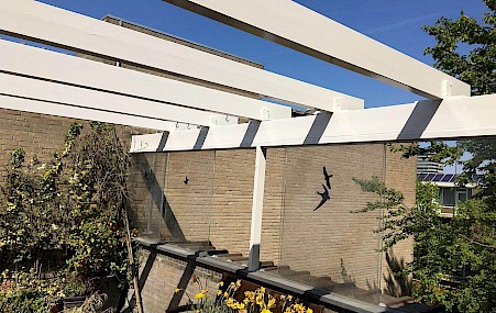 Buiten schilderwerk pergola Amstelveen